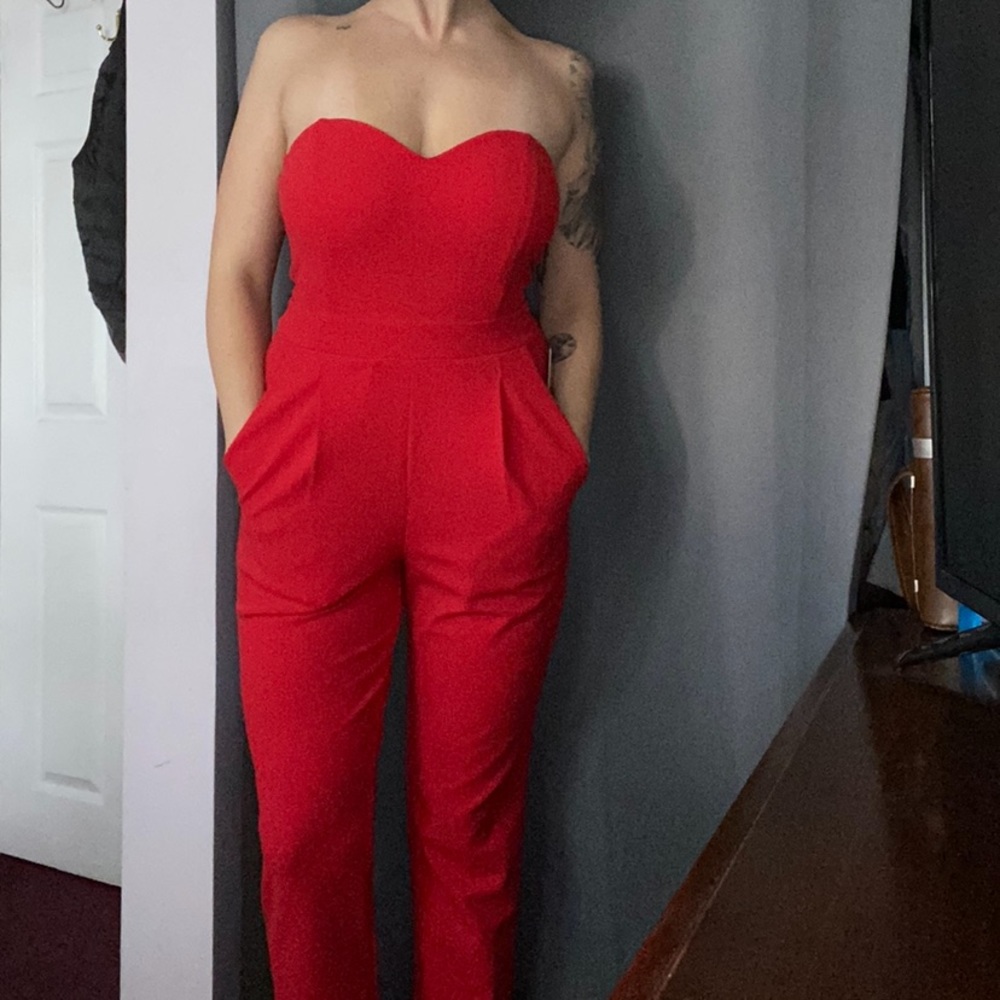 Lightly worn red express jumpsuit with pockets